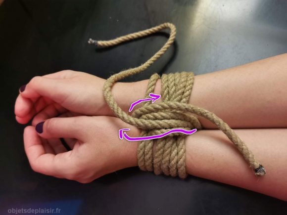 Tying wrists with a bondage rope